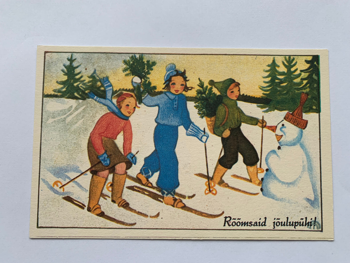 Estonian Christmas / New Year Art Greeting card - Children skiing - Snowman - Reproduction from old postcard - 1990 - unused